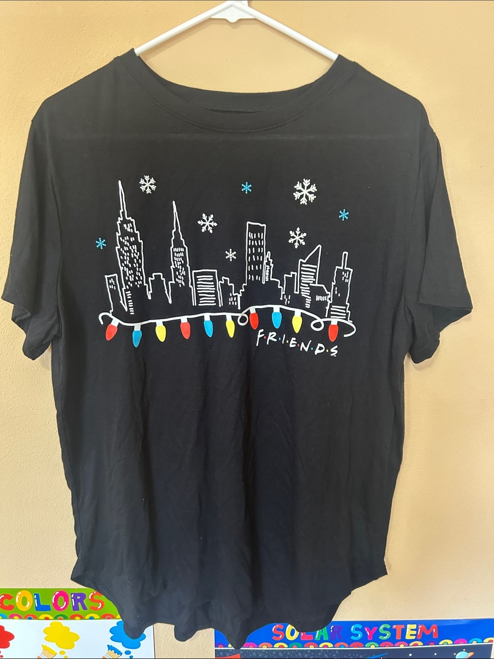FRIENDS Black Tee with Holiday Skyline and Multicolor Lights